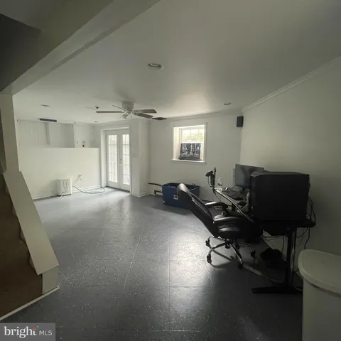 a bath room with a toilet and a shower