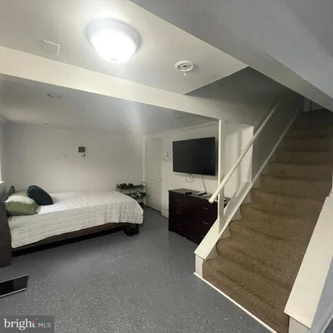 a backyard of a house with yard and outdoor seating