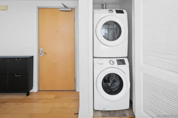 a utility room with dryer and washer