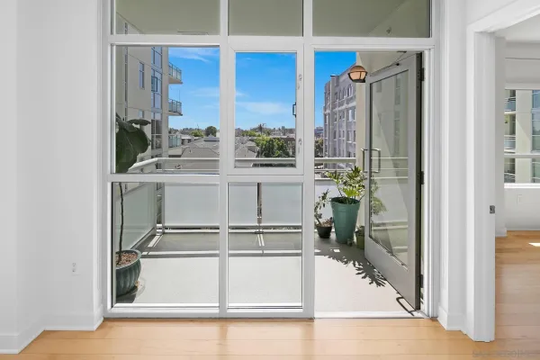 a view of balcony with furniture