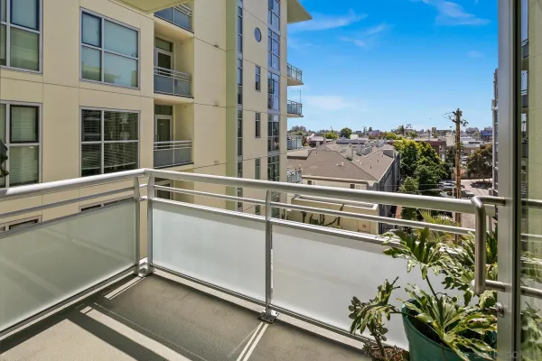 a view of a balcony with chair
