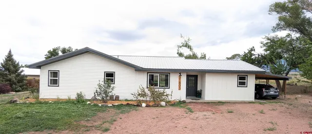 a view of a house with a patio