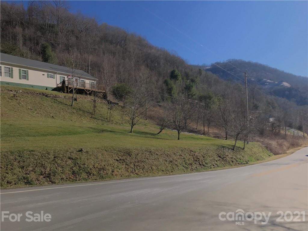 5110 Liner Creek Road Clyde, NC 28721 - Photo 15 of 15 a view of a yard with a barn