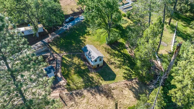 a backyard of a house with lots of green space