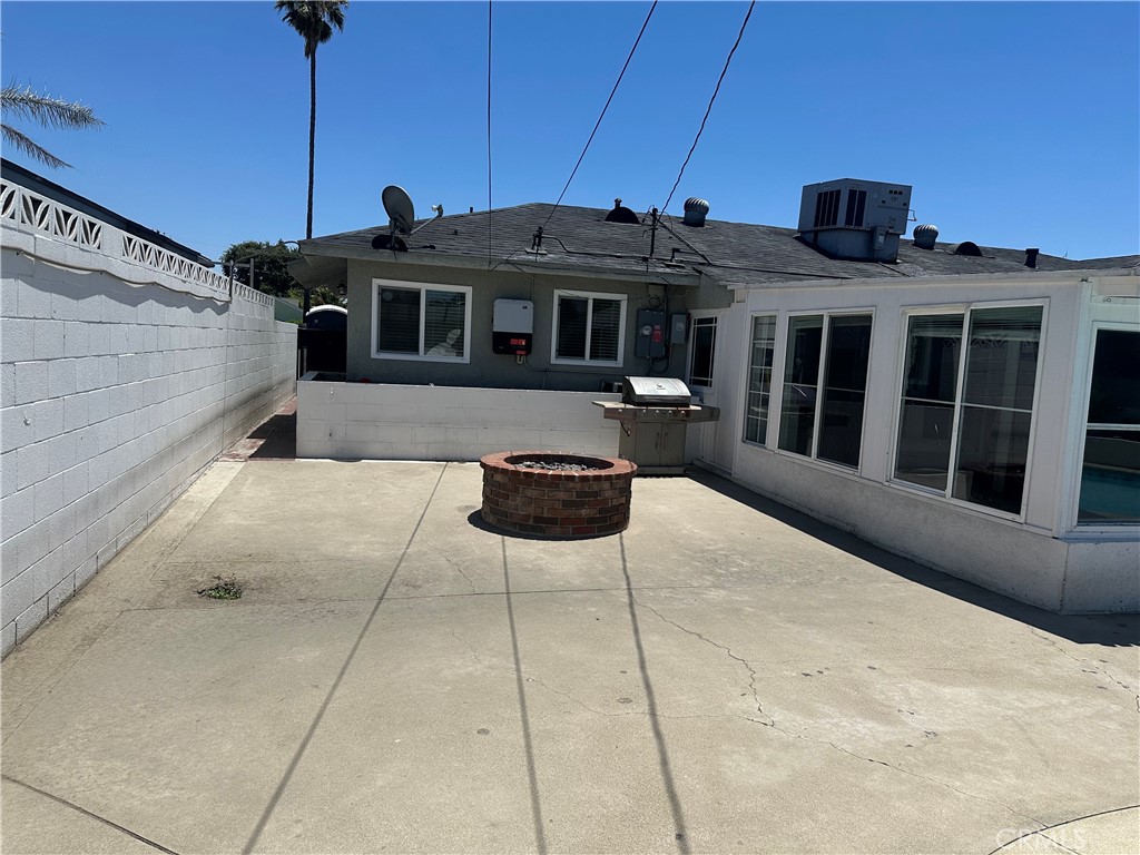 114 South Acacia Avenue Rialto, CA 92376 - Photo 21 of 27 view grilling area and sunroom