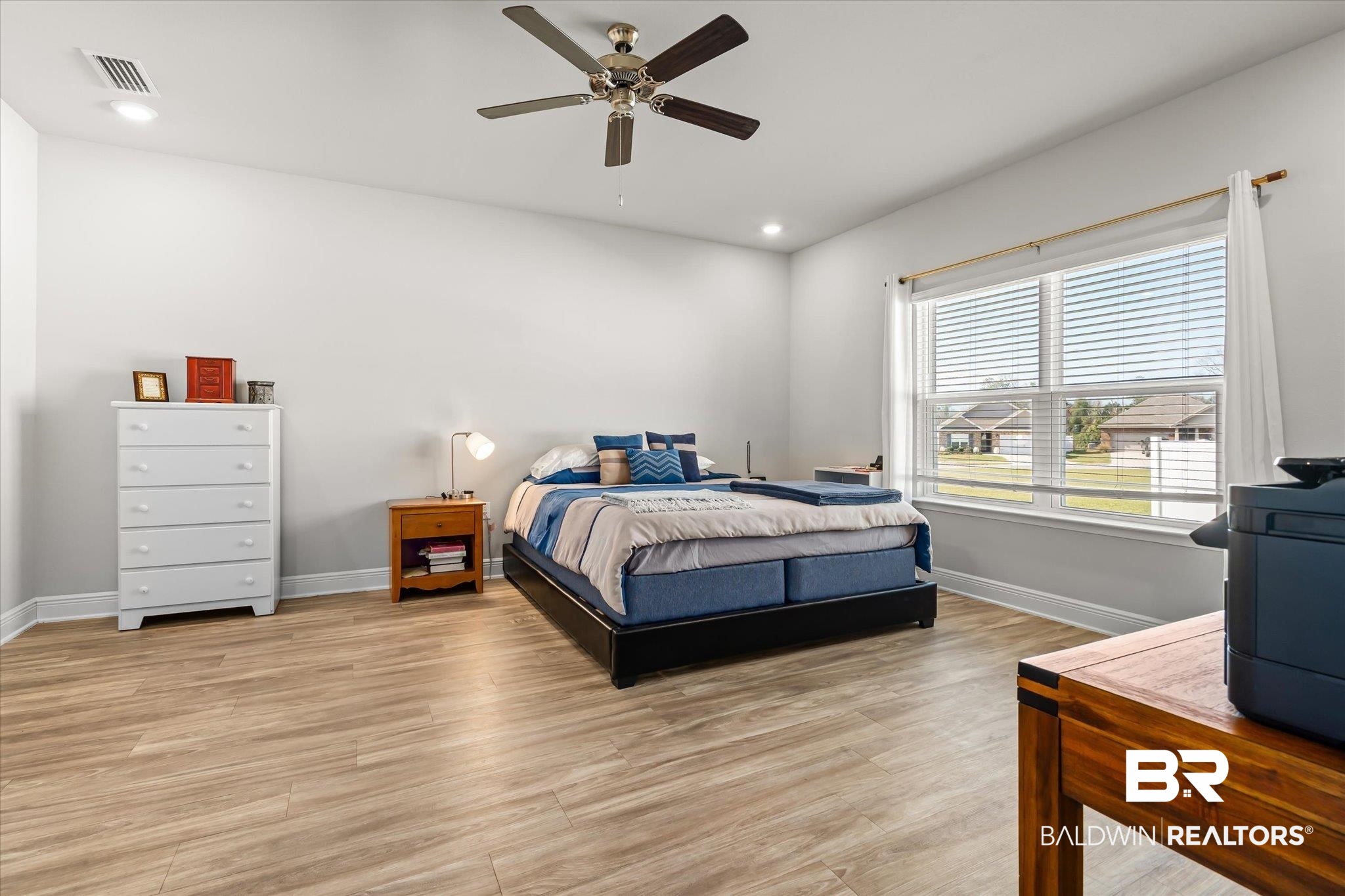 24262 Alydar Loop Daphne, AL 36526 - Photo 8 of 33 Bedroom with recessed lighting, baseboards, visible vents, and light wood finished floors