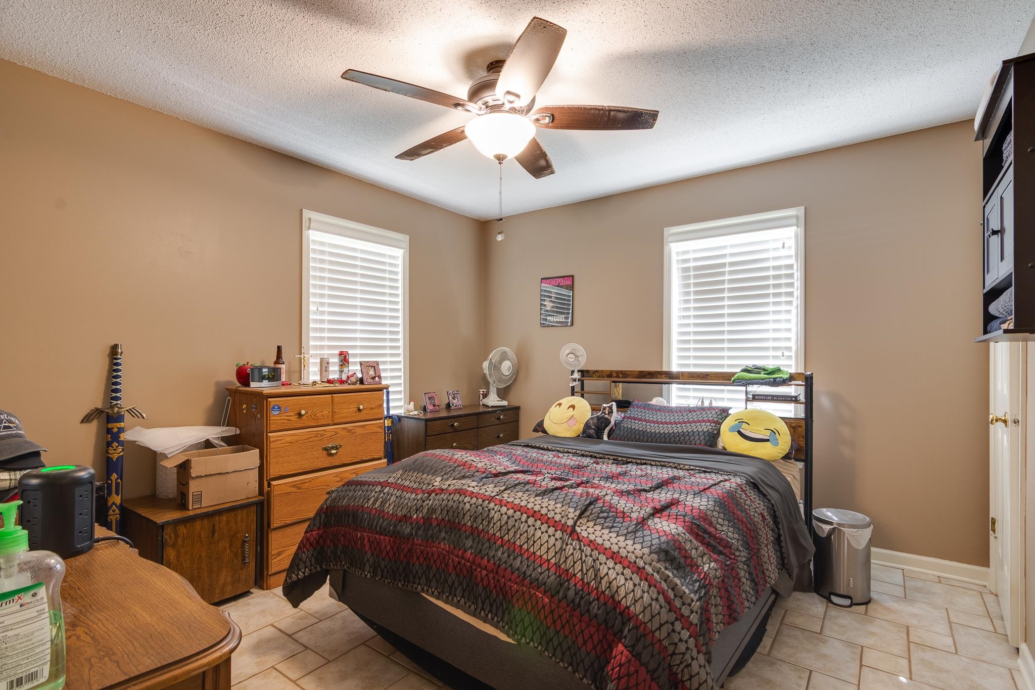 4099 Soderlund Cove Millington, TN 38053 - Photo 13 of 26 Bedroom featuring ceiling fan and a textured ceiling