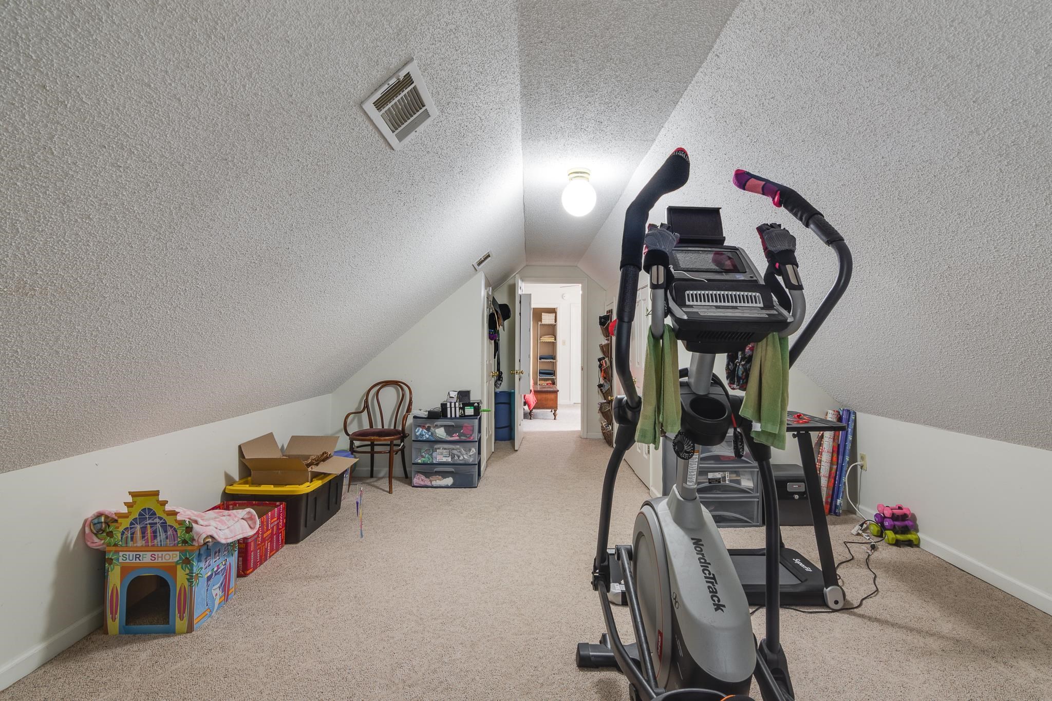 4099 Soderlund Cove Millington, TN 38053 - Photo 17 of 26 Exercise area with a textured ceiling and light carpet