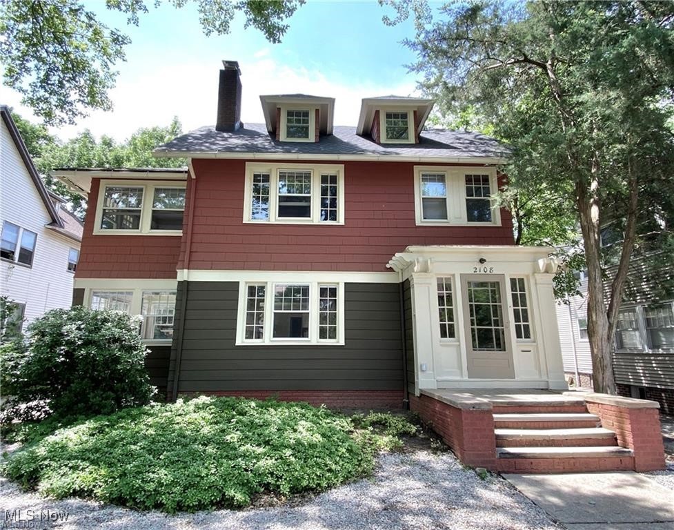 Rear view of house with a chimney