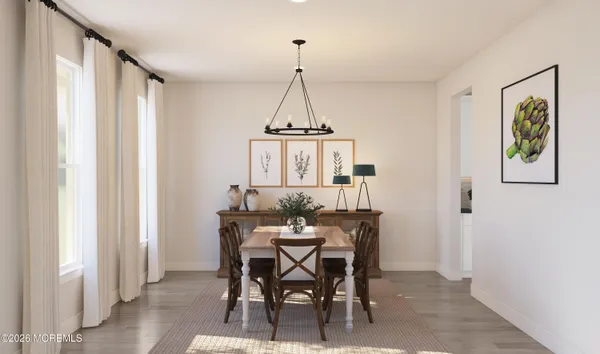 a dining room with furniture window and outdoor view