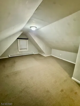 a view of a room with an empty space