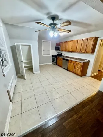 a view of kitchen with furniture and window