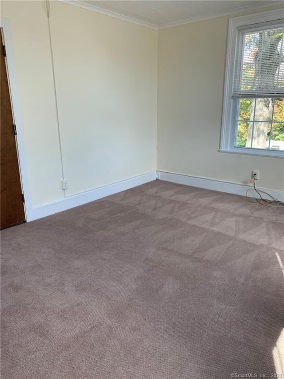 198 Flax Hill Road, Unit 3 Norwalk, CT 06854 - Photo 5 of 12 a view of an empty room with a window