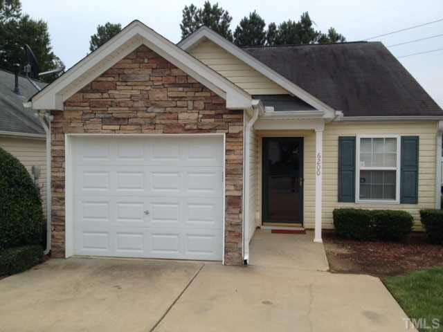 6200 Quitman Trail Raleigh, NC 27610 - Photo 1 of 10 a front view of a house with a yard