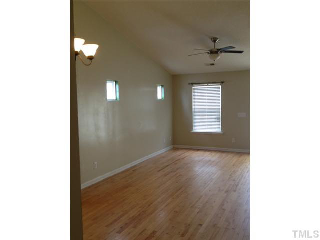 6200 Quitman Trail Raleigh, NC 27610 - Photo 4 of 10 a view of an empty room with a window