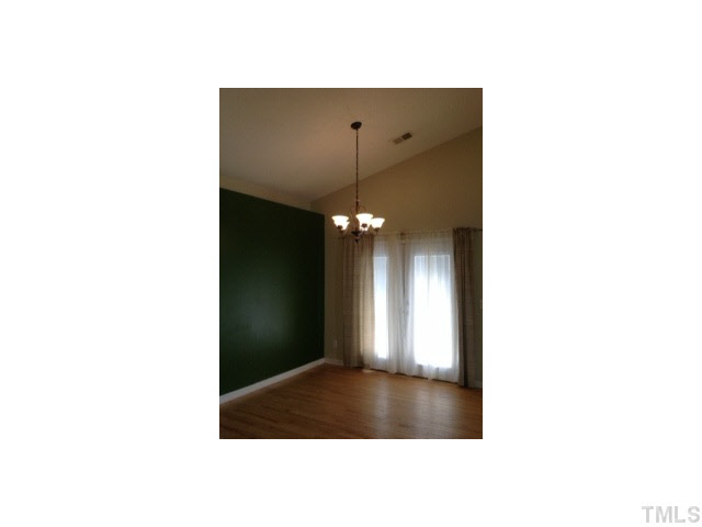 6200 Quitman Trail Raleigh, NC 27610 - Photo 5 of 10 a view of a hallway with a large window