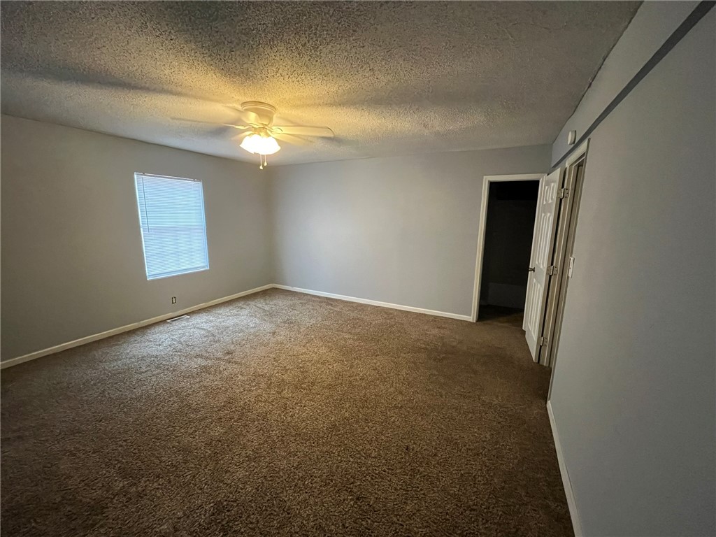 207 Woodspur Road Irmo, SC 29063 - Photo 9 of 11 Master bedroom