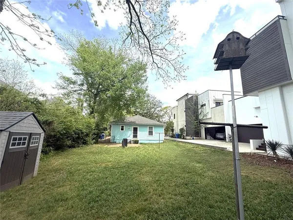 a front view of house with yard and seating area