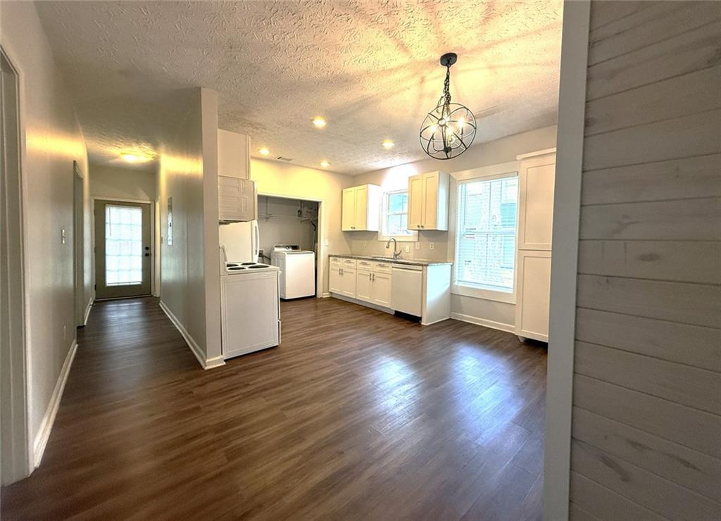 173 Cleveland Street Southeast Atlanta, GA 30316 - Photo 5 of 16 a view of a kitchen from the dinning room