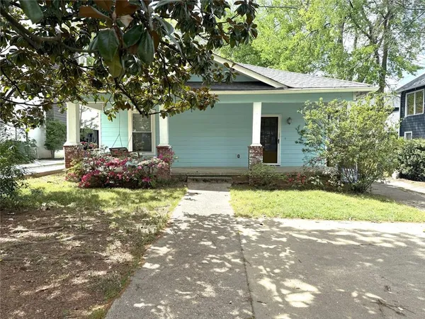 a front view of house with yard