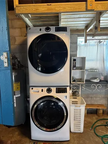 a utility room with dryer and washer