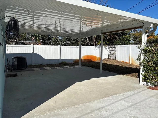 a view of a backyard of the house