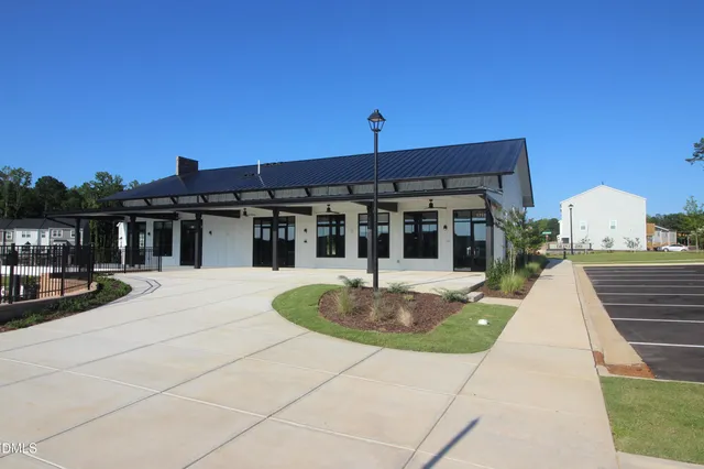 a view of a balcony with chairs