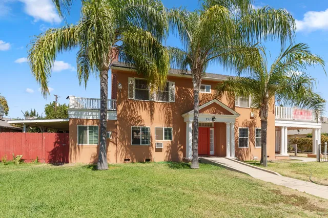 a view of a house with a swimming pool