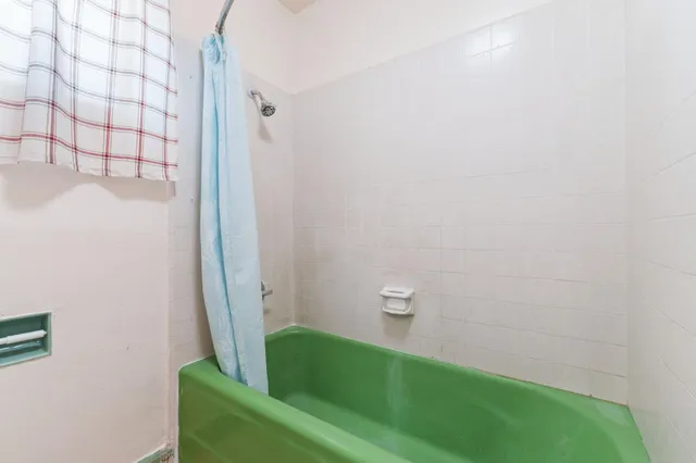 a bathroom with a sink and a shower
