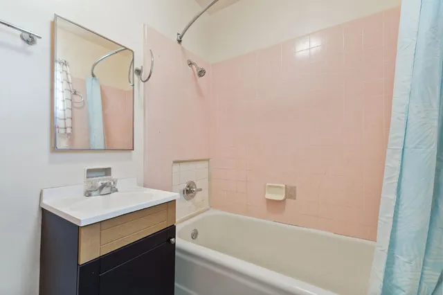 a bathroom with a sink and a bathtub