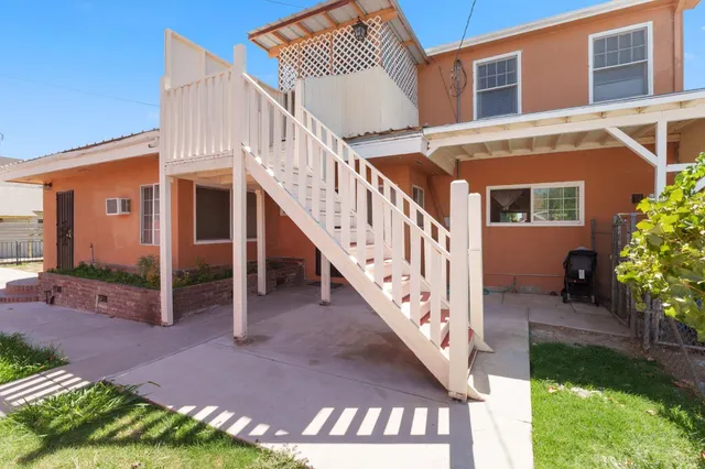 a view of stairs and yard