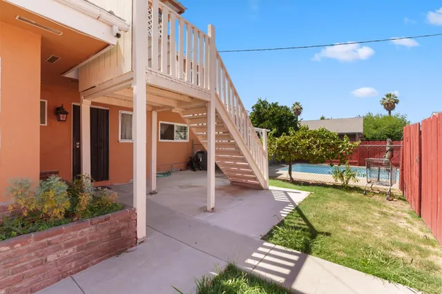 a view of a house with a swimming pool