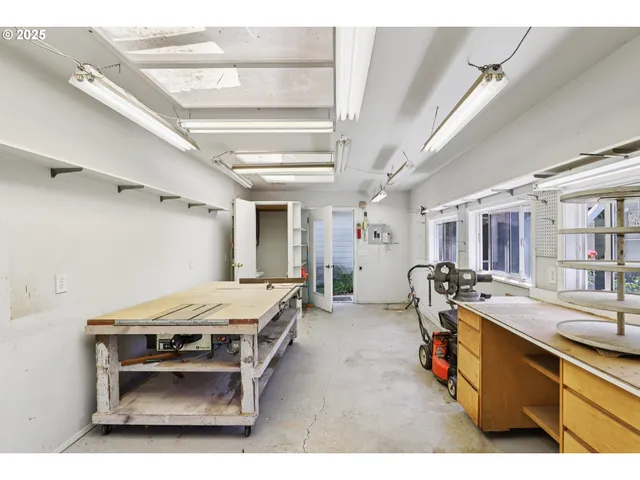 a room with furniture and flat screen tv