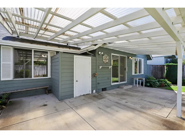 a view of a room with wooden walls