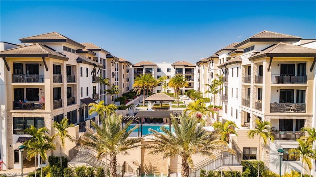 1130 3rd Avenue South, Unit 410 Avon Park, FL 33825 - Photo 1 of 21 View of property featuring pool.