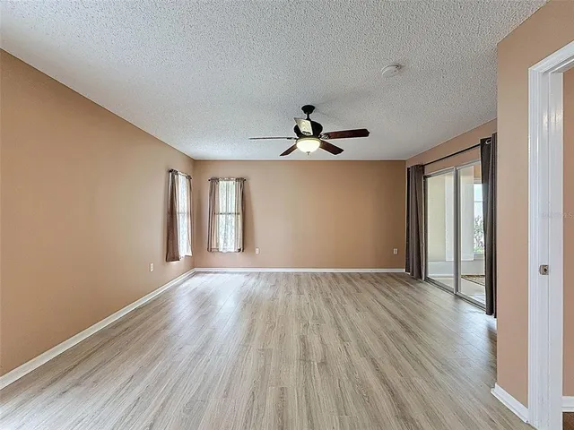 a view of a house with backyard