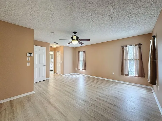 an aerial view of a house with a outdoor space