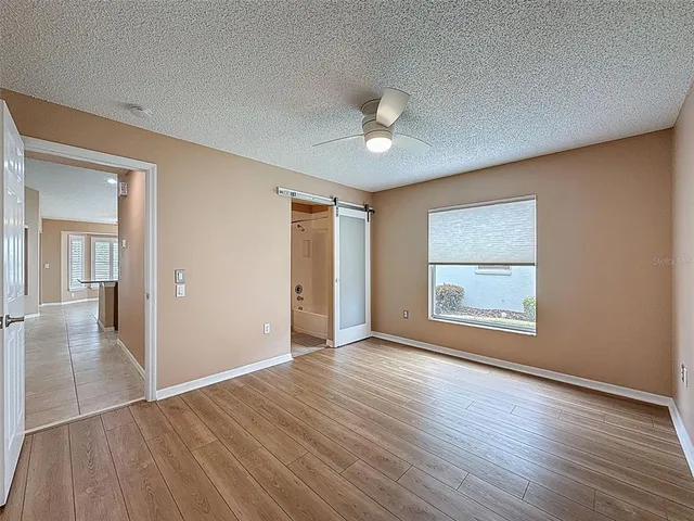 a view of a swimming pool with a yard