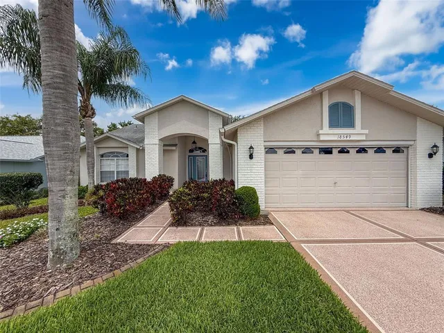 $380,000 | 18549 Grand Club Drive, Hudson, FL 34667