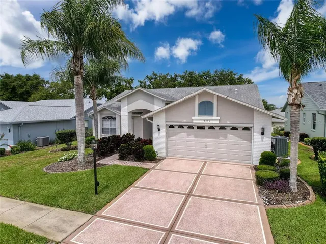 $380,000 | 18549 Grand Club Drive, Hudson, FL 34667