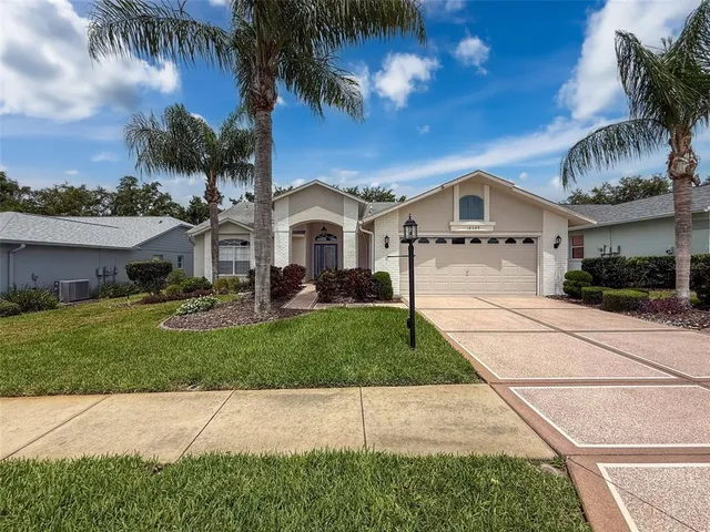 $380,000 | 18549 Grand Club Drive, Hudson, FL 34667