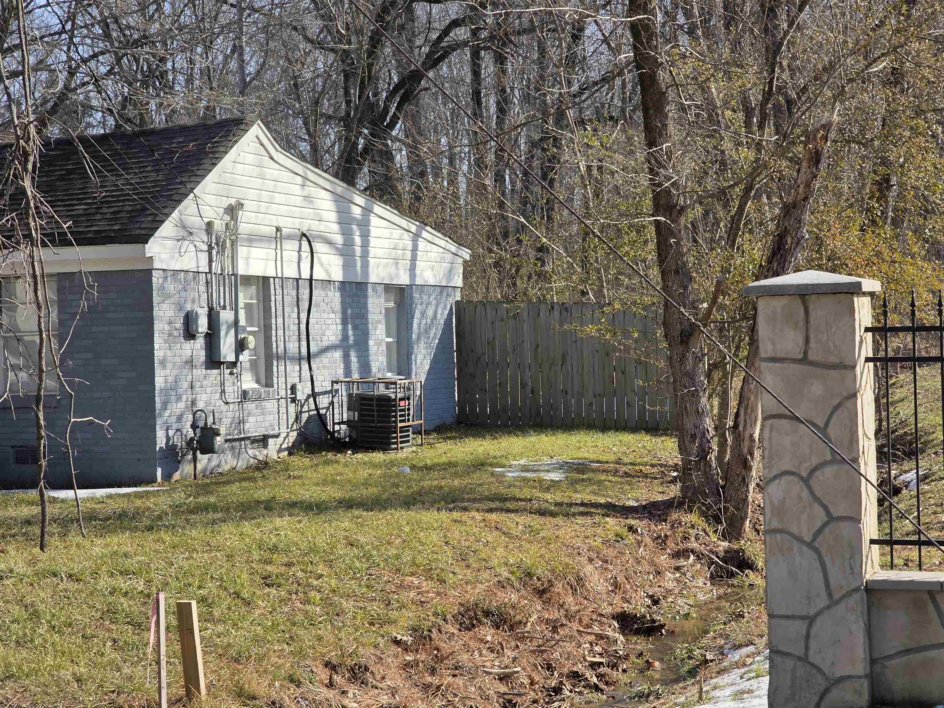 1432 Bridgewater Road Cordova, TN 38018 - Photo 2 of 2 a view of a house with backyard and sitting area