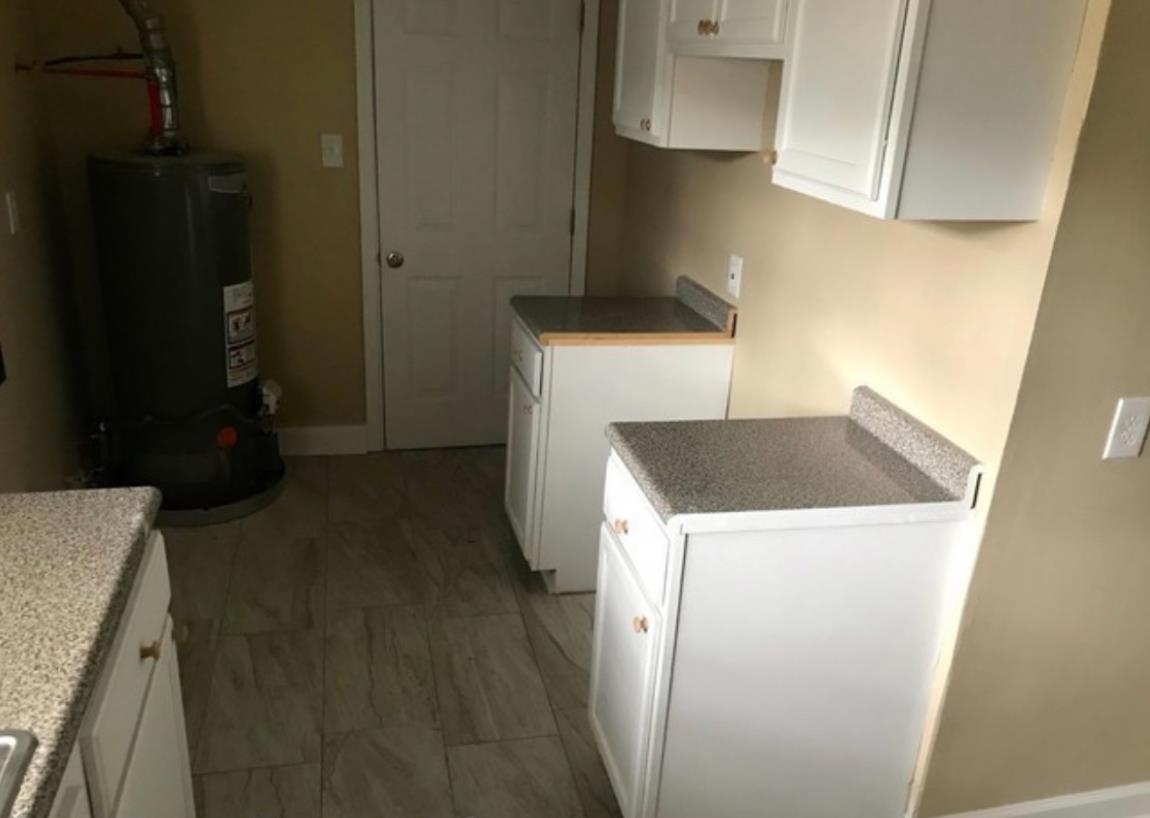 1432 Bridgewater Road Cordova, TN 38018 - Photo 7 of 8 a utility room with dryer and washer
