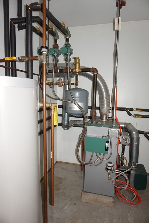573 Reservoir Road Lunenburg, MA 01462 - Photo 20 of 26 a view of a room with gym equipment