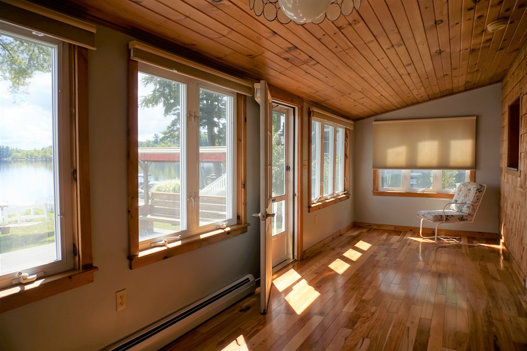 573 Reservoir Road Lunenburg, MA 01462 - Photo 4 of 26 a view of an empty room with a window