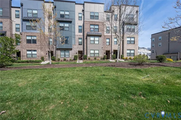a building with trees in front of it