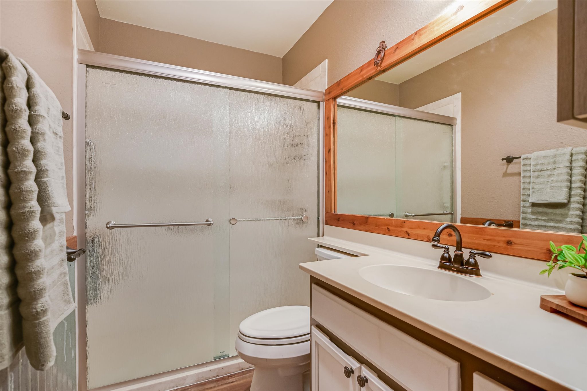 606 Splitrock Round Rock, TX 78681 - Photo 11 of 18 a bathroom with a sink and a mirror
