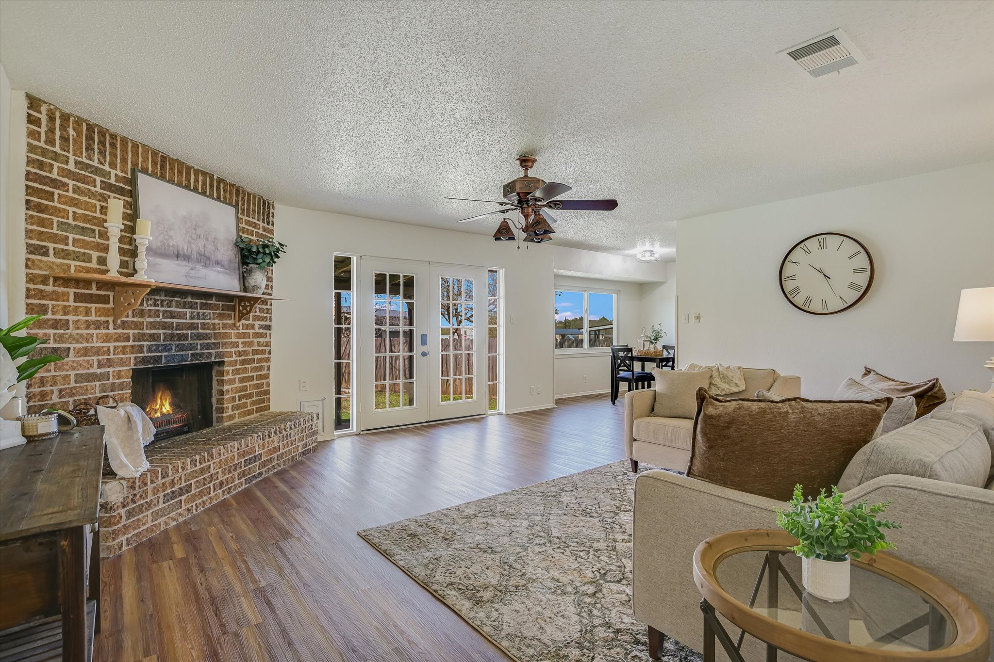 606 Splitrock Round Rock, TX 78681 - Photo 2 of 18 a living room with furniture and a fireplace
