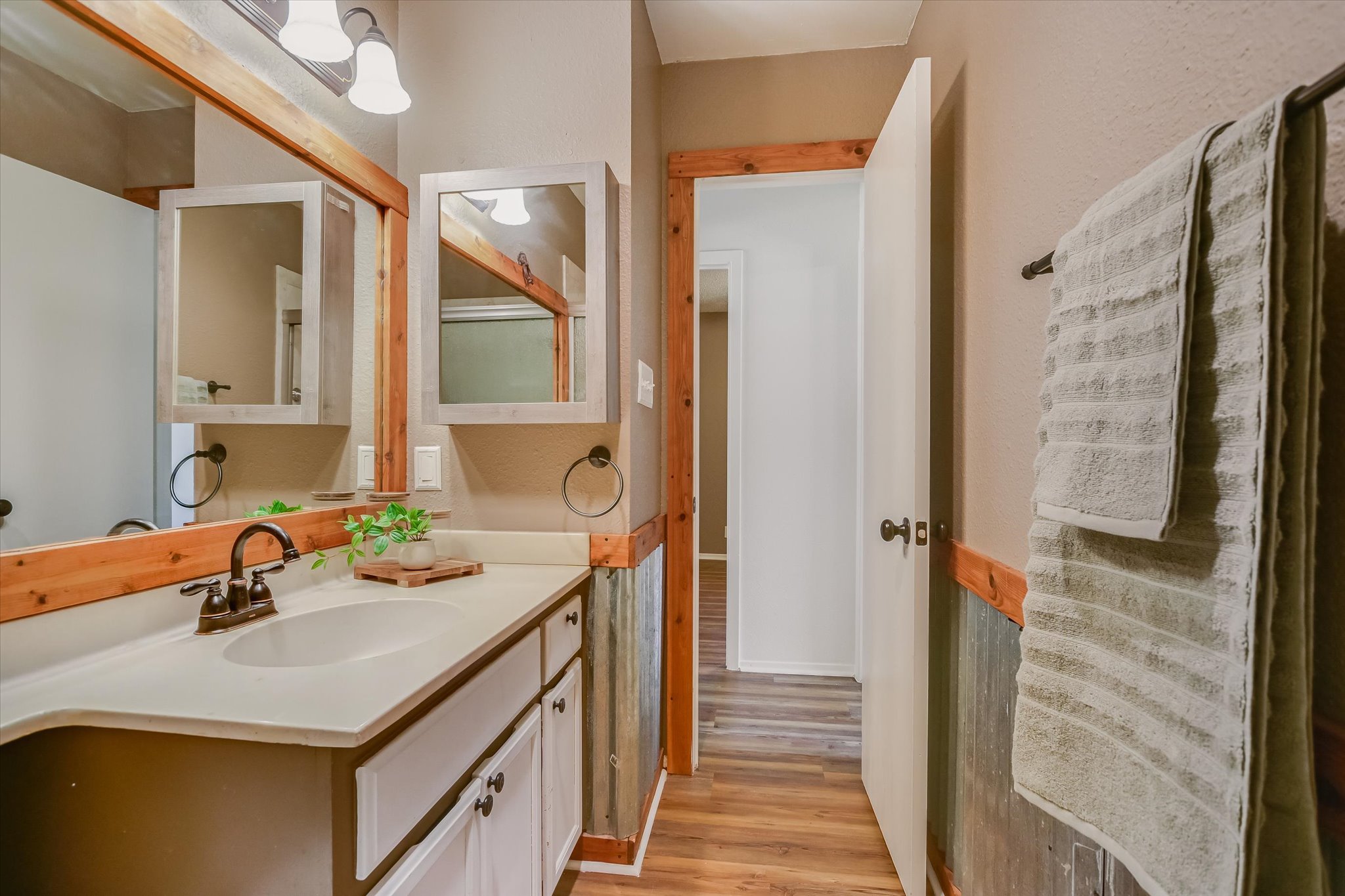 606 Splitrock Round Rock, TX 78681 - Photo 10 of 18 a bathroom with a sink vanity and a mirror