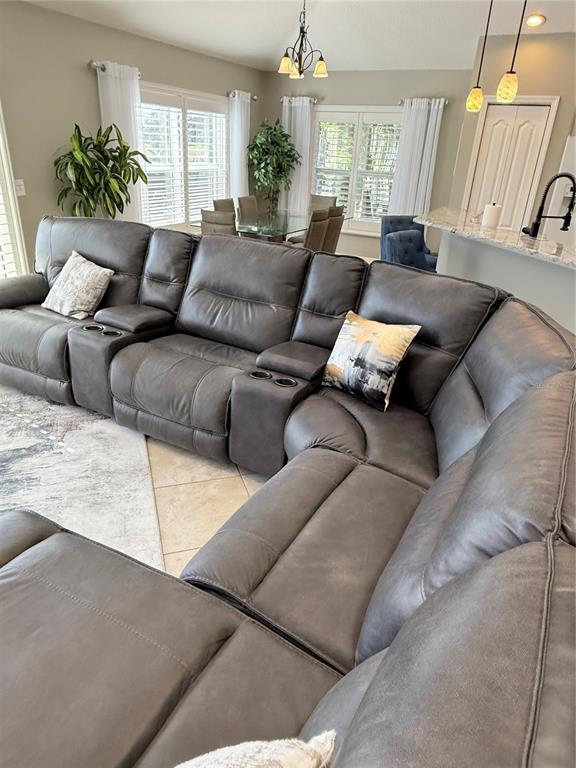 3088 Berwyn Way The Villages, FL 32162 - Photo 11 of 60 a living room with furniture and a large window